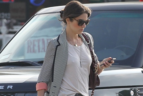 **EXCLUSIVE** Nikki Reed has some fruit snacks in hand after stopping at a nail salon in Los Angeles